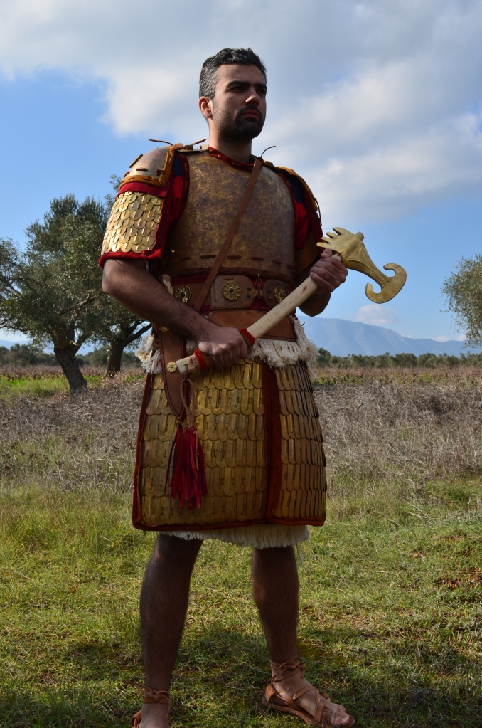 Hittite warrior, armed with axe. Reconstruction by Hellenicarmors, of an Hittite armor and weapons of the Hattusa Kingdom. The hybrid cuirass combines elements of Hittite / Assyrian / Egypt scale armors and Mycaenean plate armor. Axe, based on depiction of King's Gate at Hattusa, is shaped like warthog teeths. Association of Historical Studies KORYVANTES